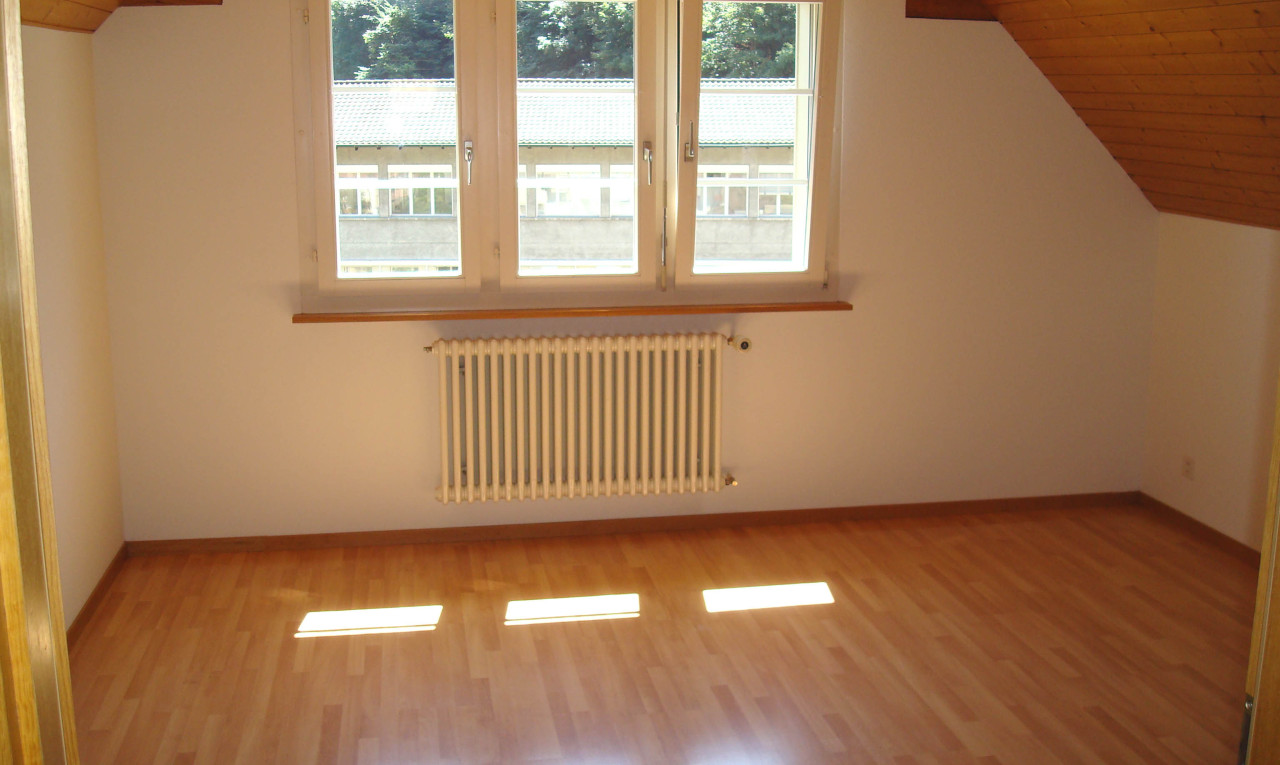 Vollvermietetes Mehrfamilienhaus mit Garage und Aussenparkplätzen - 8
