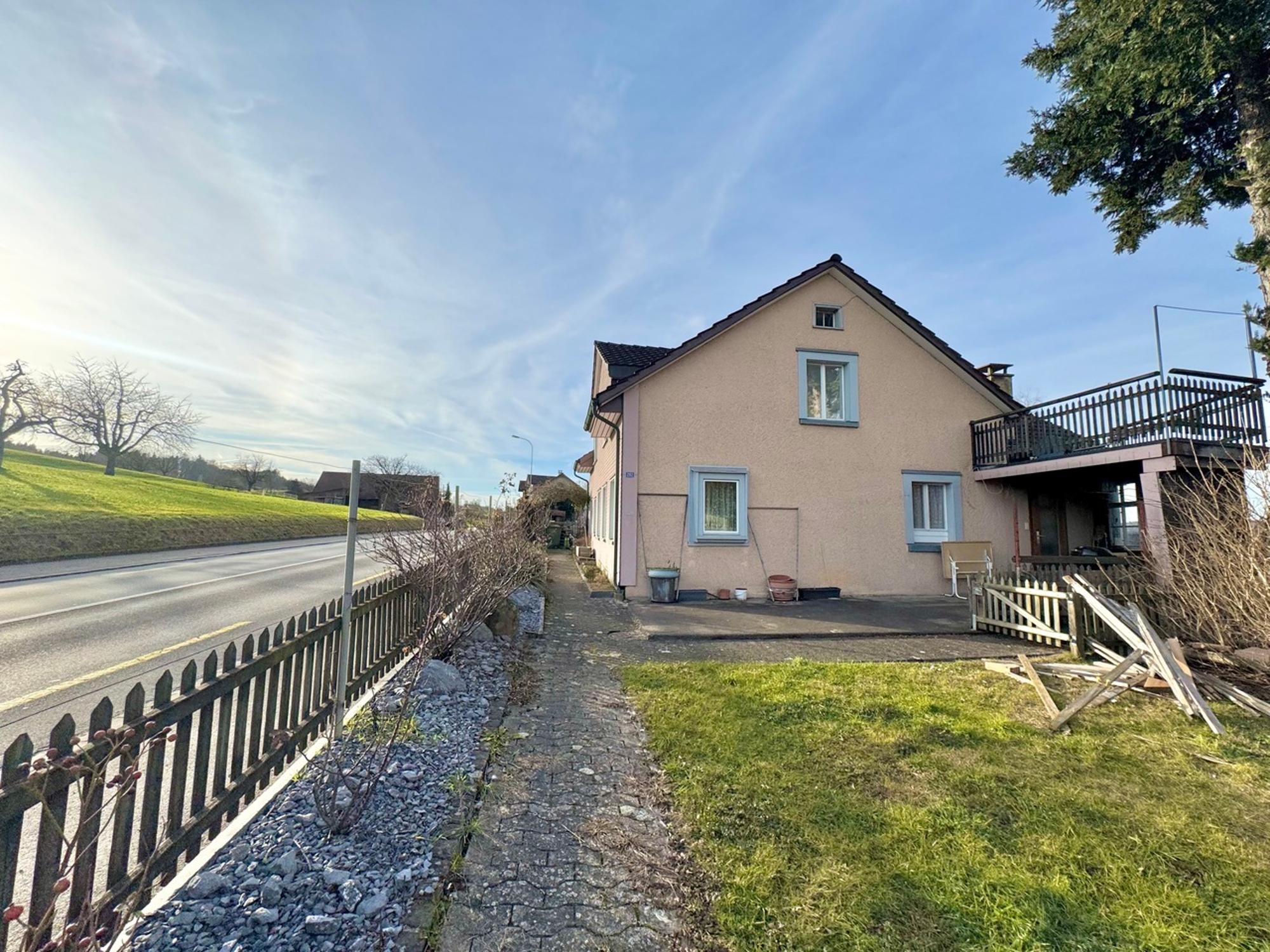 Great potential - two-family house with building plot - 2