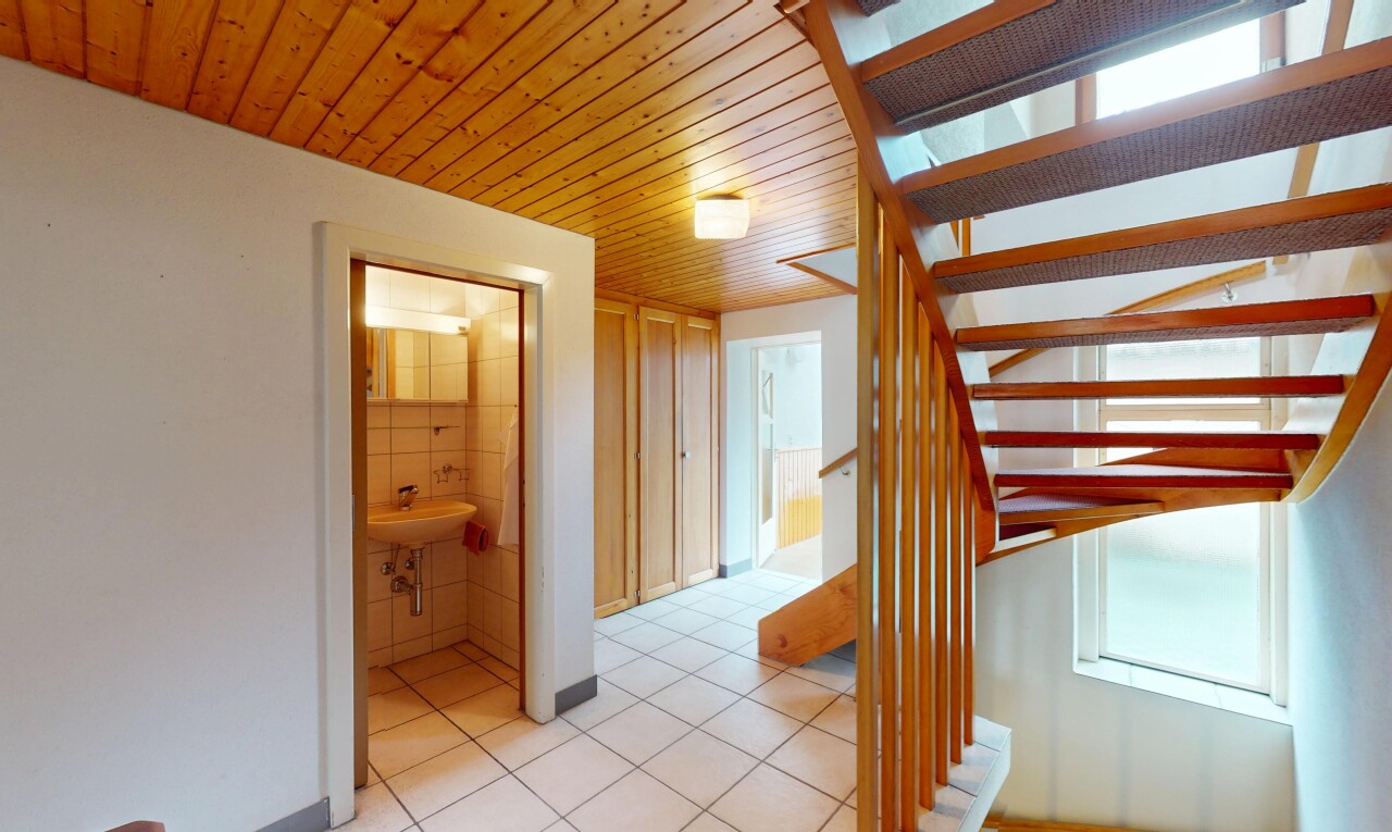 Einfamilienhaus mit Ausbaupotenzial im Zentrum von Langenbruck - 9